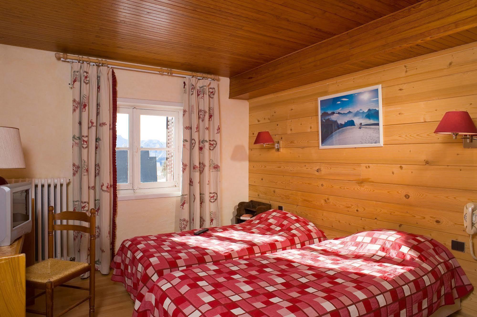 Madame Vacances Hotel Le Christina Alpe d'Huez Esterno foto